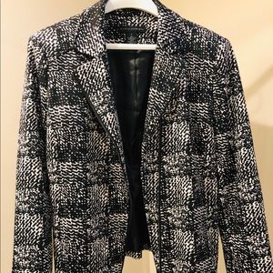 Black and white zip detail jacket